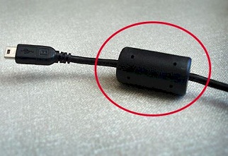 Bật mí bí ẩn của miếng hình trụ màu đen trên dây sạc laptop 